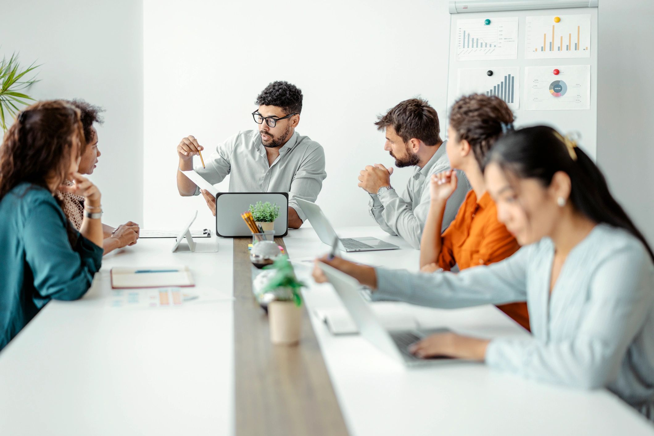 IT services team collaborating in a modern office